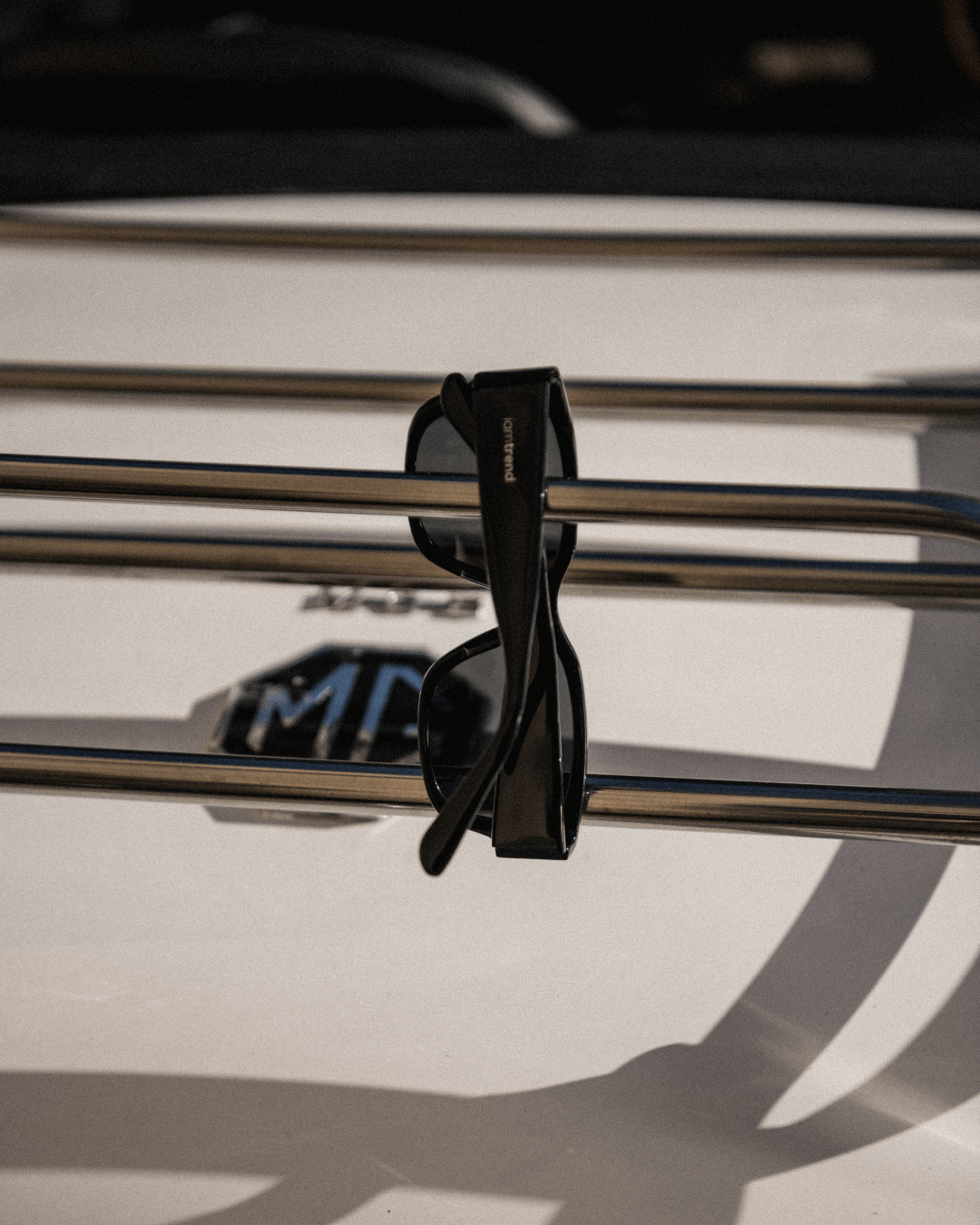 flat lay of black sunglasses with black lenses