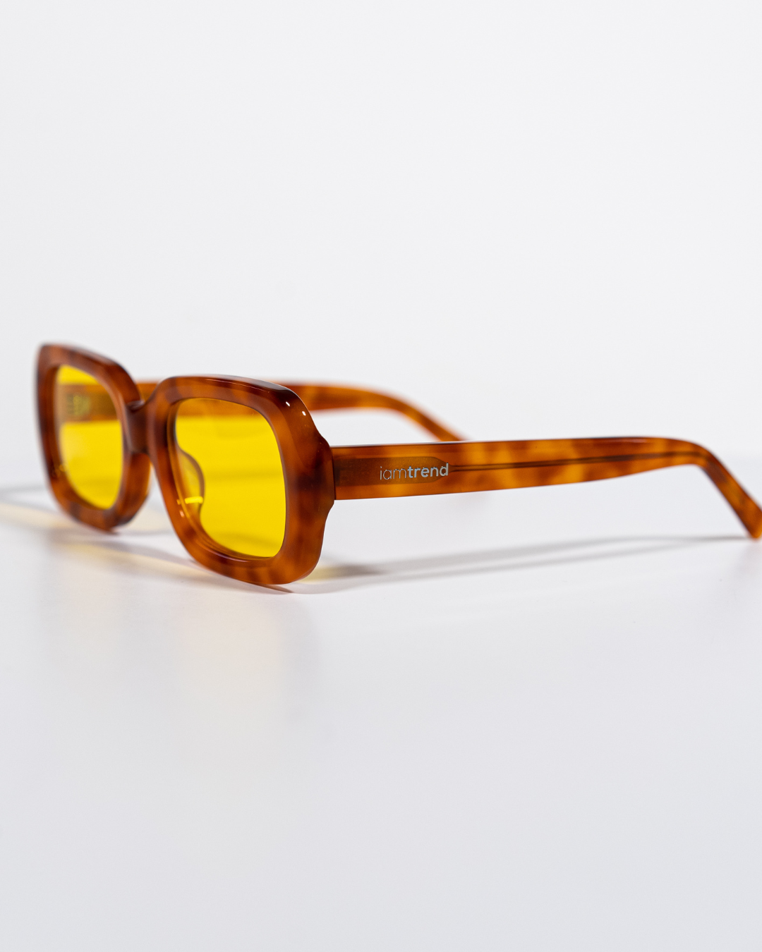 side view of rectangular polarised sunglasses with amber acetate frames