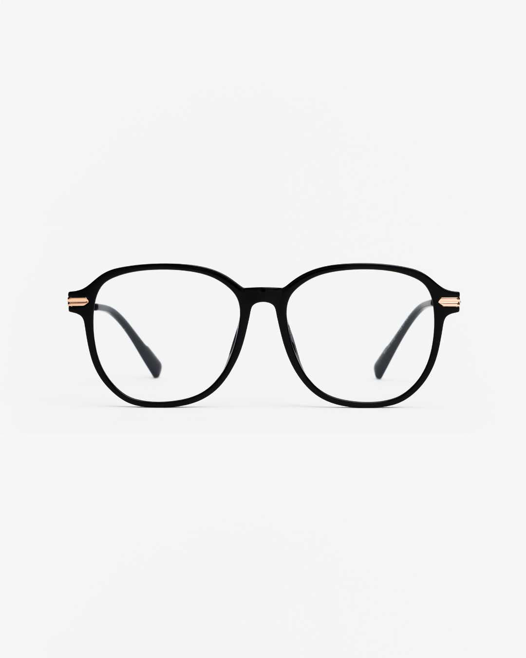 black eyeglasses with gold accents on a white background.