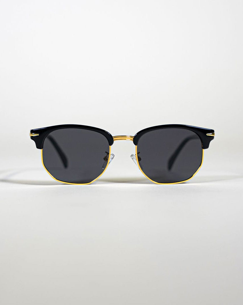 polarised square sunglasses with black and gold frames and black lenses