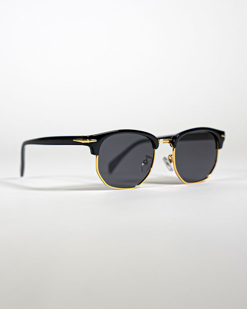 side view of polarised square sunglasses with black and gold frames and black lenses