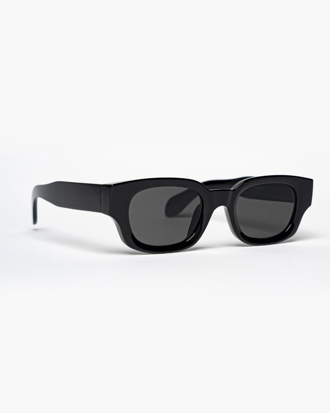 side view of rectangular sunglasses with black frames and lenses
