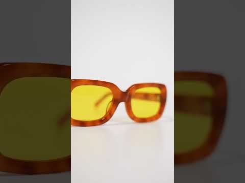 iamtrend alexis acetate sunglasses with a warm tortoiseshell frame and yellow tinted lenses.